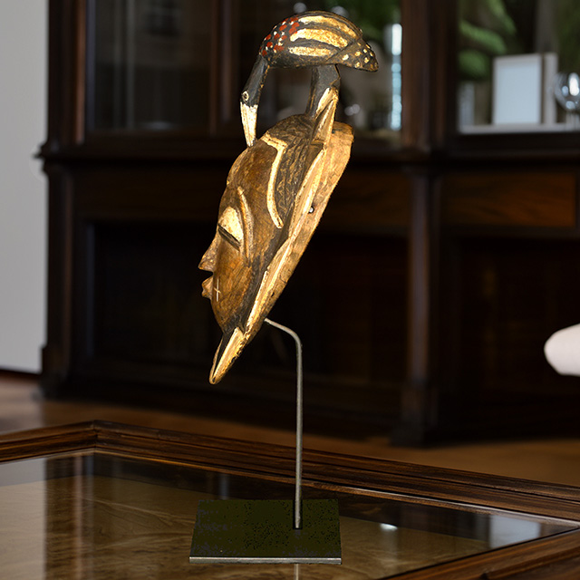 African Baule moon mask 117 on display stand left side
