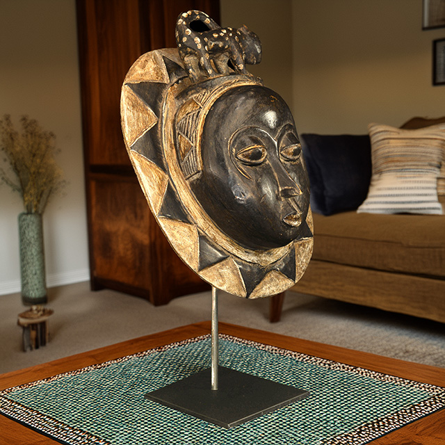 African Baule moon mask 121 on display stand