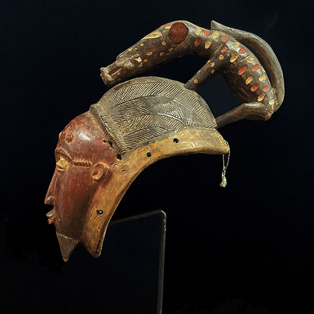 African Baule Mask 130 on stand back - Click to zoom. African Baule Mask 130 on stand back