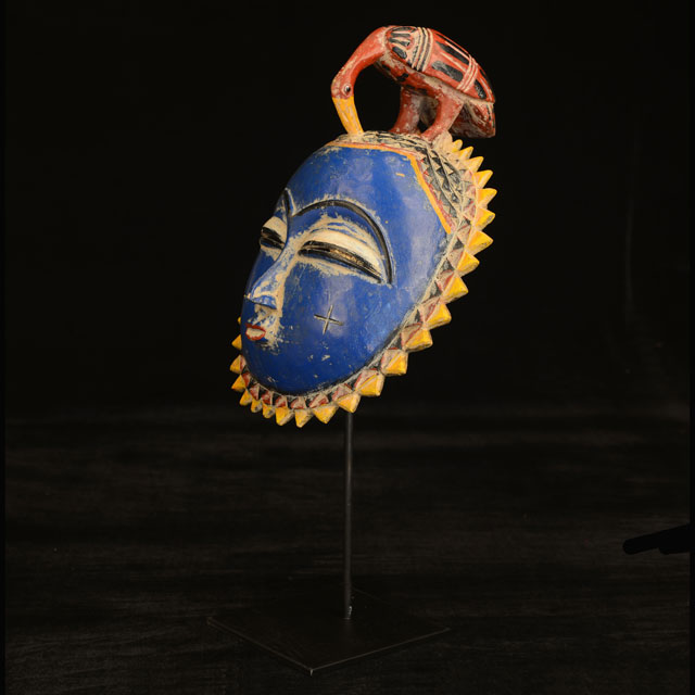 African Baule Moon Mask 116 on display stand Left Angle