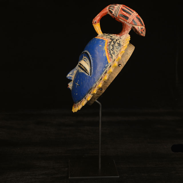 African Baule Moon Mask 116 on display stand left side