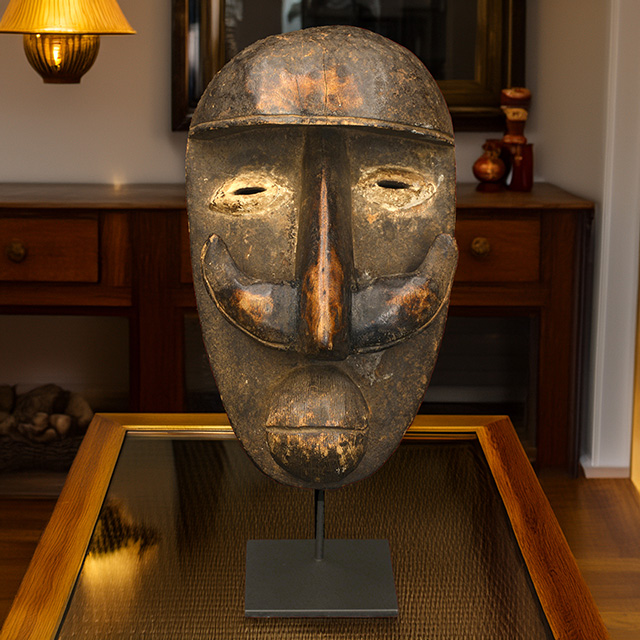 African Bete mask on display stand