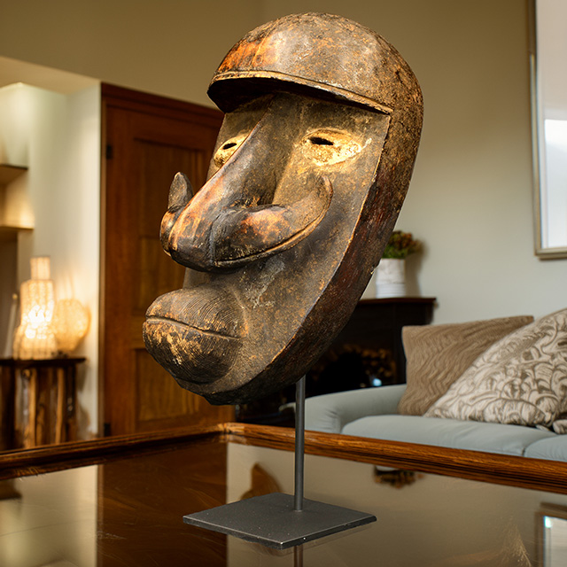 African Bete Mask on display stand