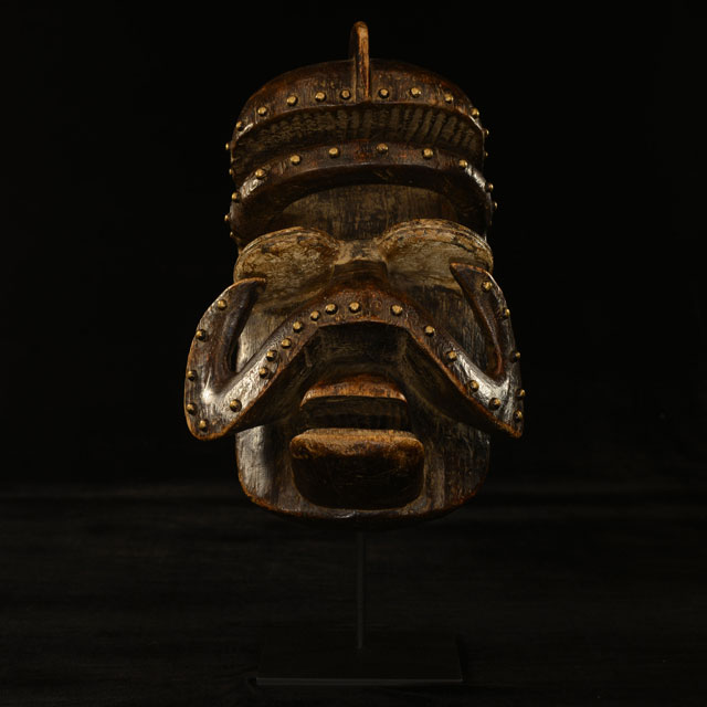 African Bete Mask 9 on display stand 