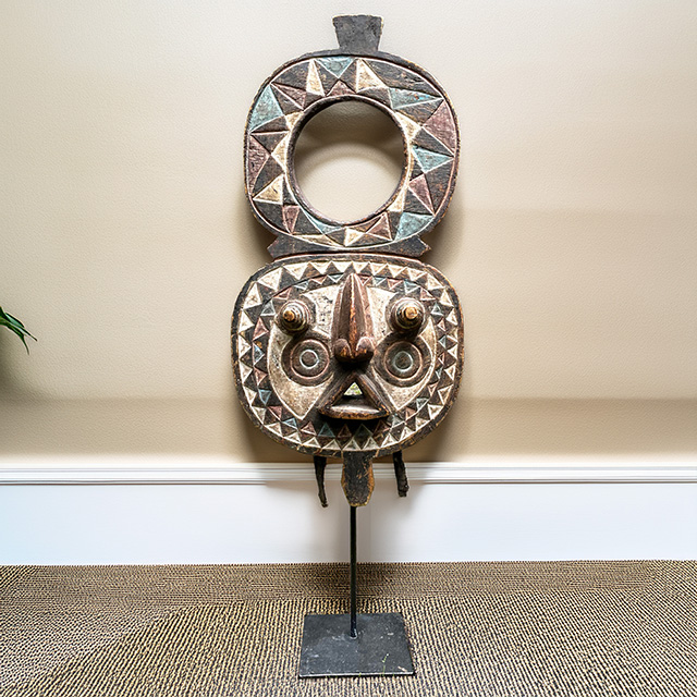 African Bobo mask on display stand