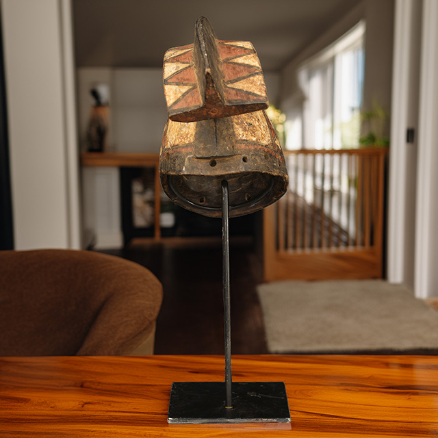 African Bobo mask on display stand