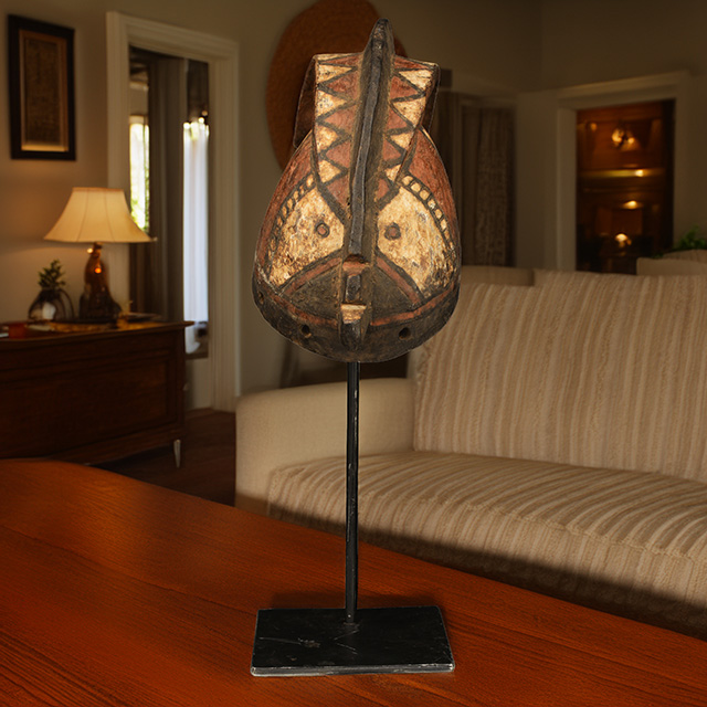 African Bobo mask on display stand