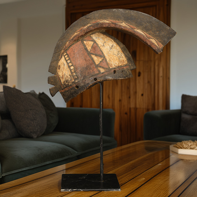 African Bobo mask on display stand left side