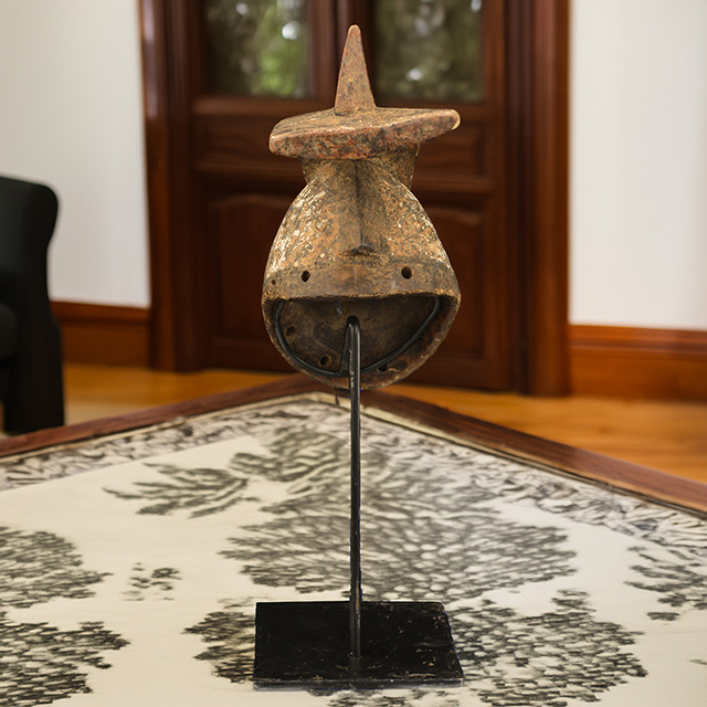 African Bobo mask on display stand