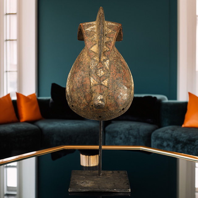 African Bobo mask on display stand