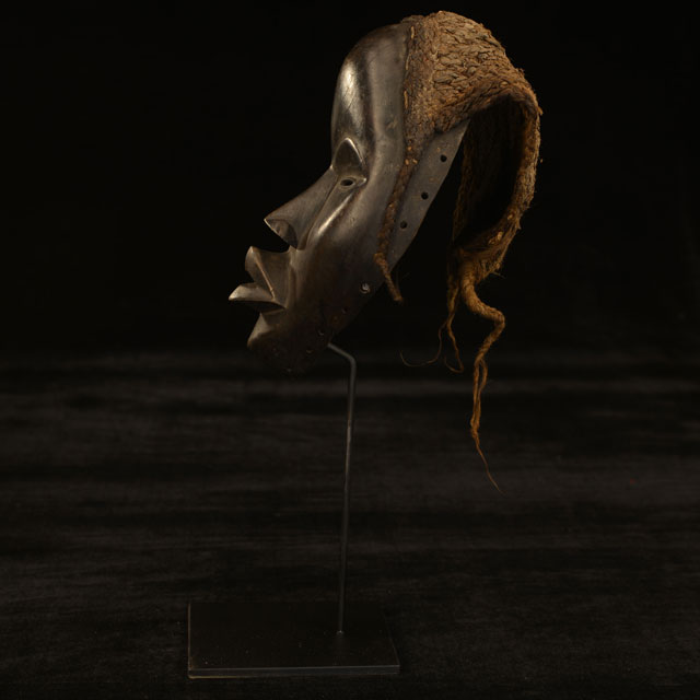Dan Mask 69 on display stand left side