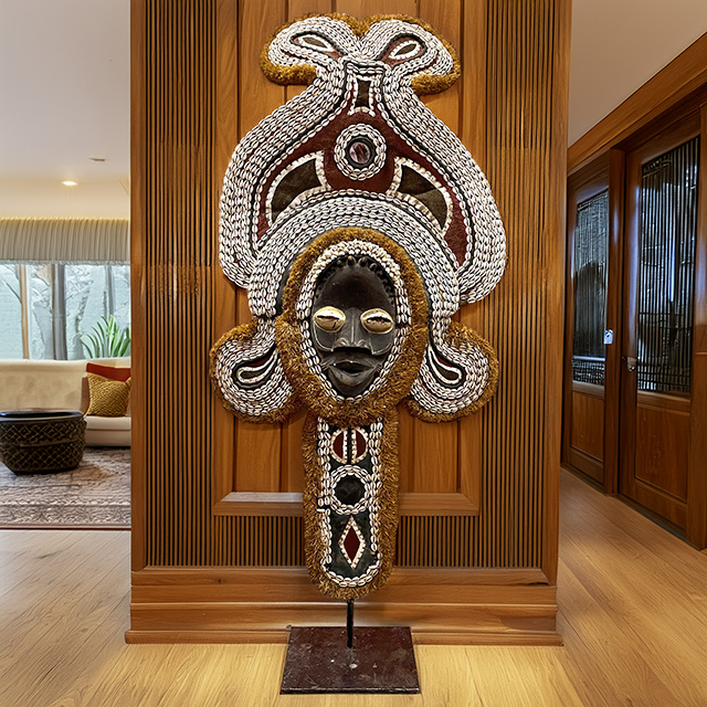 Large African Dan mask on display stand